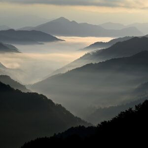 mountains with clouds in the valley