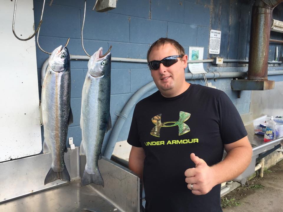 Nathan Oak with two huge fish he caught